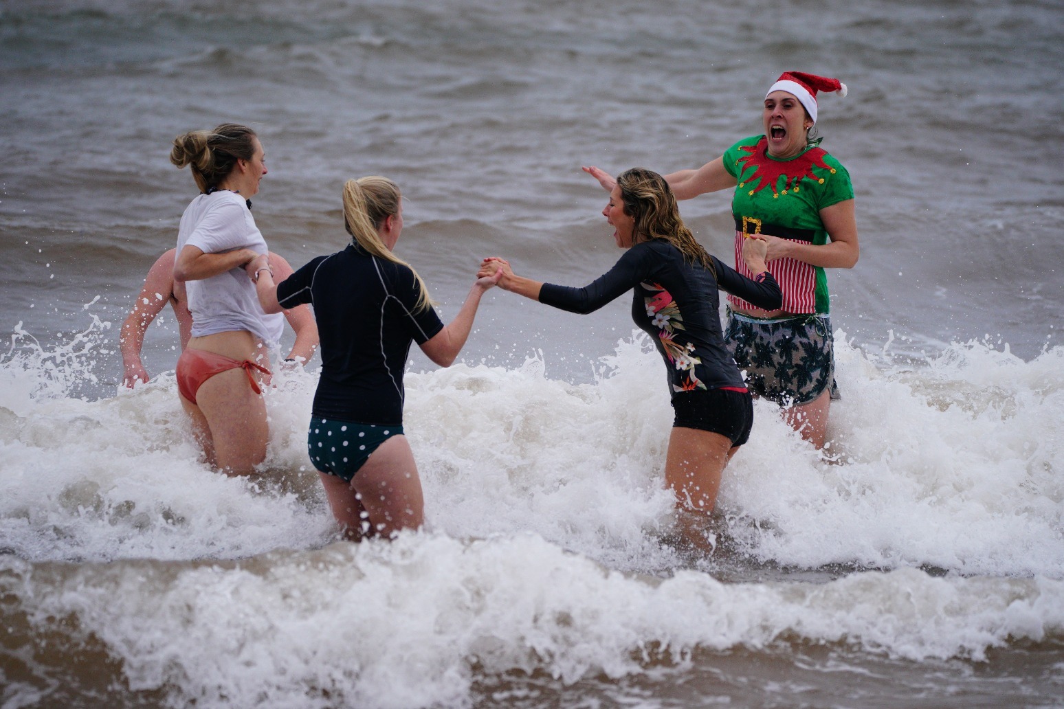 Swimmers brave the cold sea for Christmas Day dip 