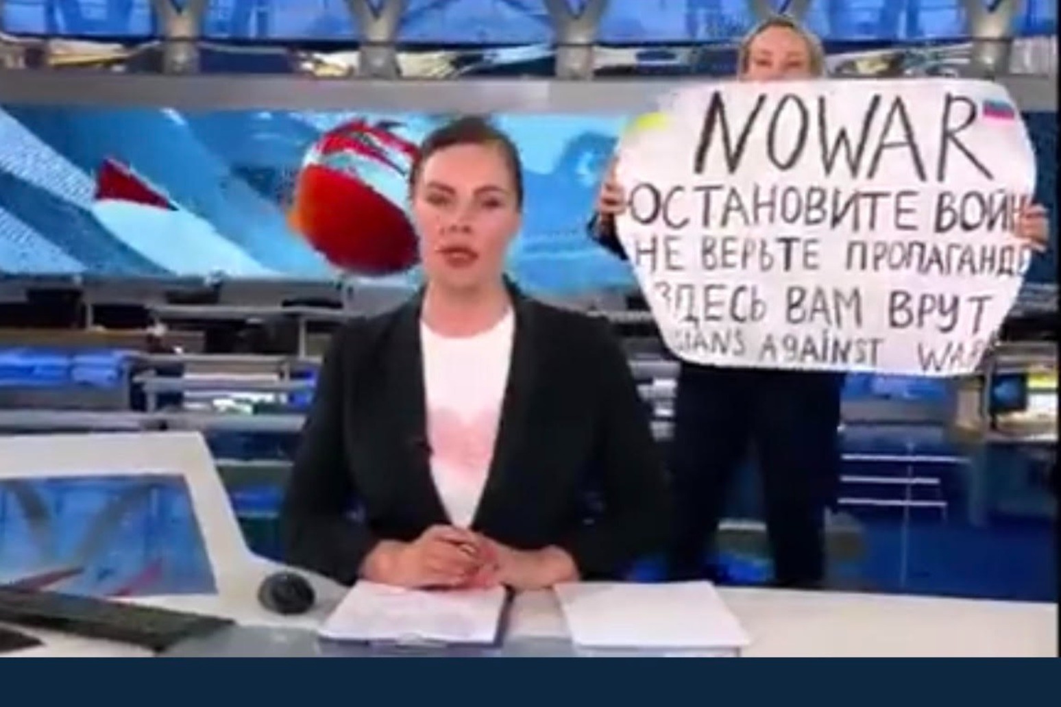 Anti-war activist interrupts live Russian state TV news show 