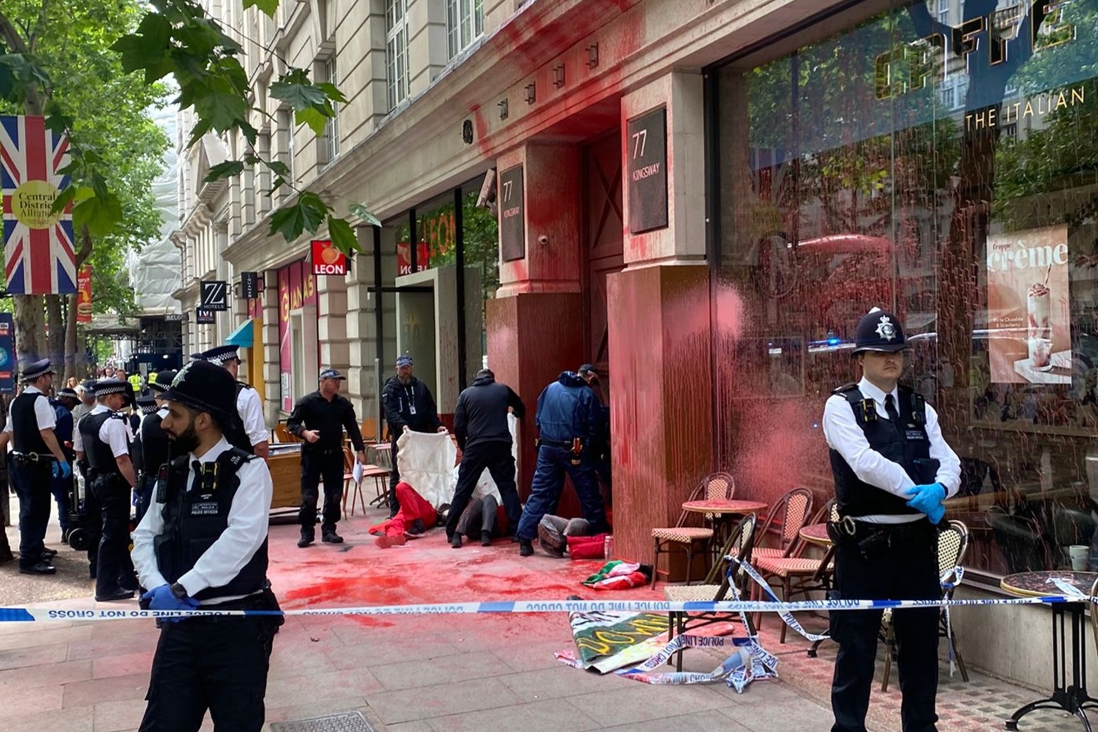 Four Palestine protesters arrested after covering London building in paint 