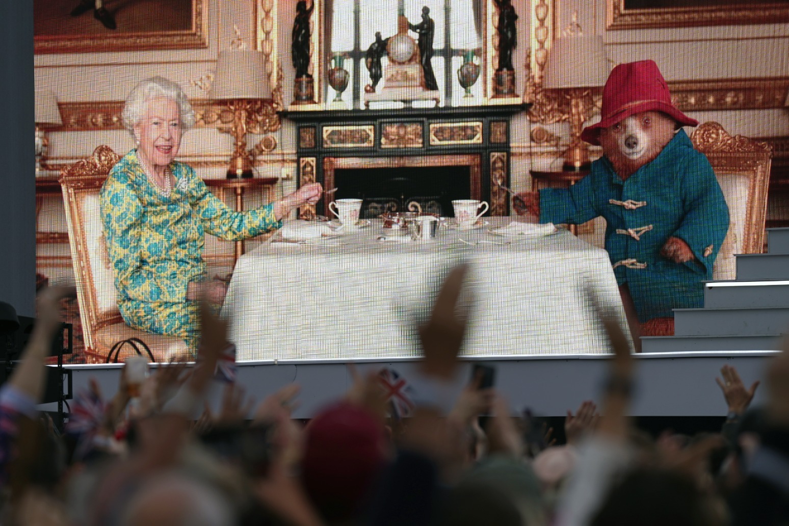 Queen launches Platinum Party with tea with Paddington 