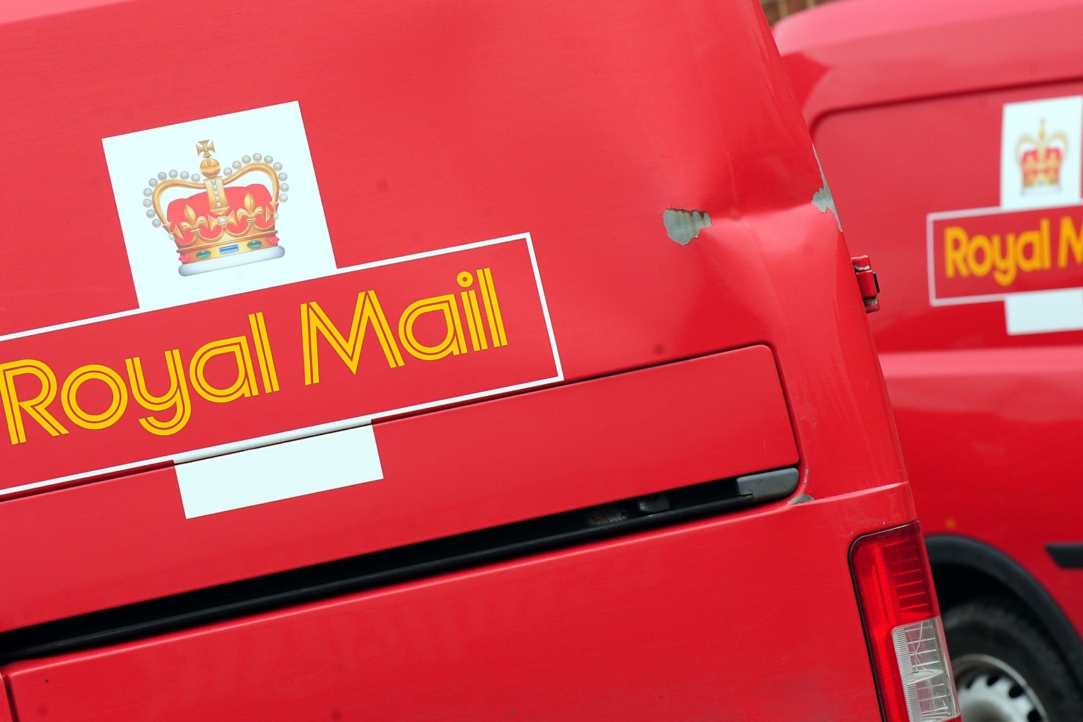 Royal Mail workers and university lecturers continue industrial action on Friday 