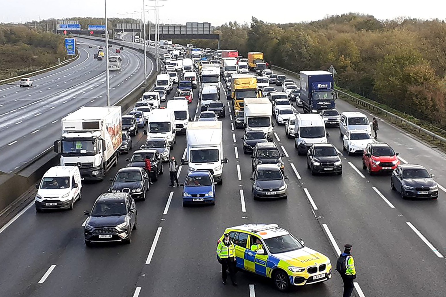 Sixteen arrested as Just Stop Oil protesters block M25 for second day 