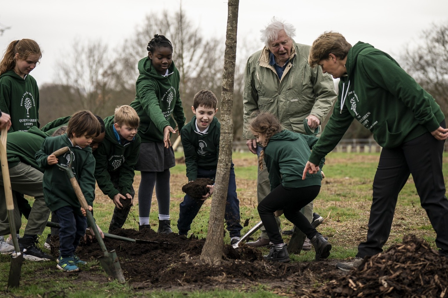 Sir David Attenborough plants tree to open woodland in honour of late Queen 